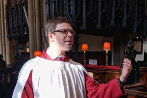 Image of Alex Woodrow conducting