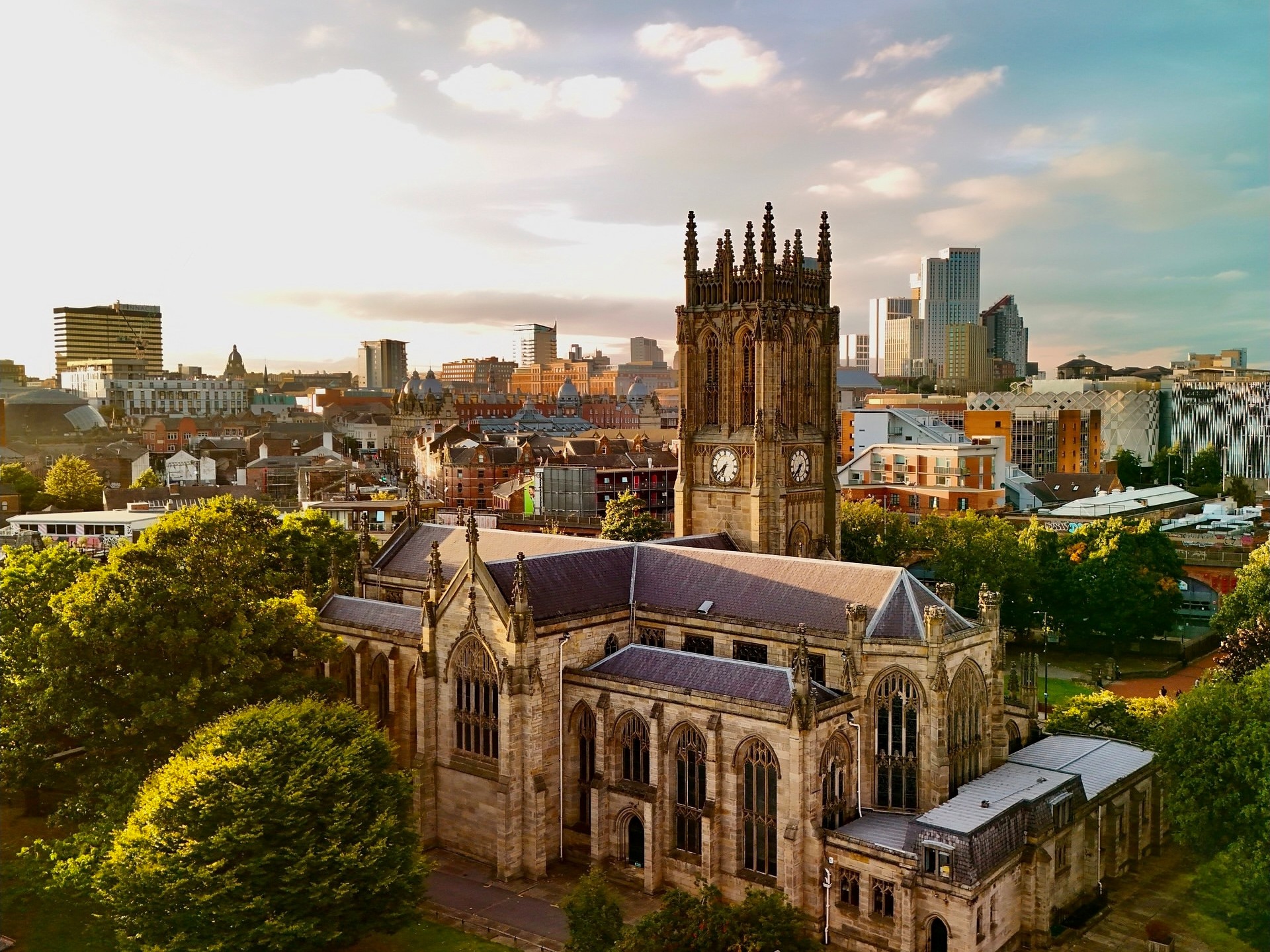 An aerial view of Leeds Minster with Leeds CIty in the background